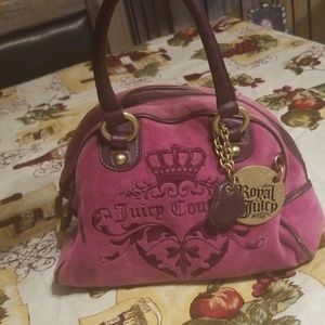 Juicy Couture purple with burgundy accents.  Gold